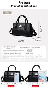 Detailed dimensions of the black crocodile textured handbag showing 28x21x14cm size