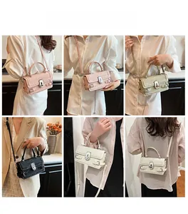 Crocodile embossed leather crossbody bags shown in four colors on a fashion model