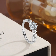Macro shot of S925 sterling silver ring with floral zircon setting and S925 hallmark