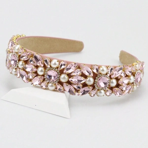 Elegant wide pink headband with faceted pink crystals and pearls in floral pattern