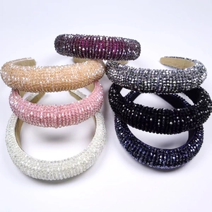 Detail of six padded crystal beaded headbands showing sparkling stones and non-slip lining