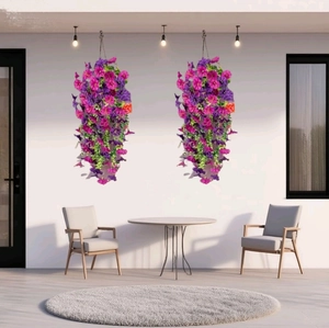 Detail of hanging artificial morning glory vines in pink and purple for balcony decor
