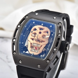 Detail of rose gold skull dial with ruby inlay and tonneau case on luxury men's watch