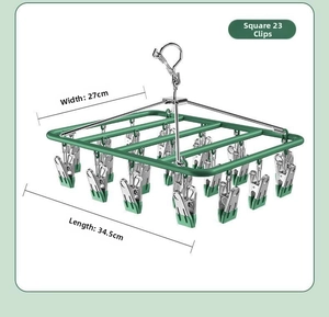 Green stainless steel sock drying rack with 23 clips, size 34.5x27cm for balcony.