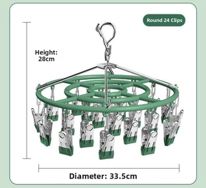 Green circular laundry drying rack with 24 clips, height 28cm and diameter 33.5cm