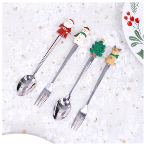 Detailed view of 304 stainless steel Christmas spoons and forks with festive 3D figures