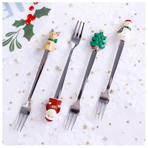 Detail of 304 stainless steel dessert forks with Santa and snowman resin handles