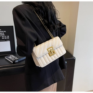 White quilted rectangular crossbody bag with gold chain strap and metal interlocking buckle