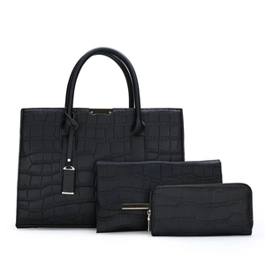 Detailed set of black crocodile pattern handbags including tote, envelope bag and wallet