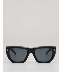 Detail of black polygon sunglasses with signature silver metal arrow rivets on the frame