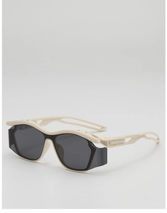 Detailed side view of off-white sports sunglasses featuring protective side shields