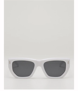 Detailed view of white polygonal sunglasses with silver shield accents and grey lenses