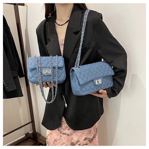 Chic quilted denim chain bag with metallic turn-lock closure for women's crossbody style
