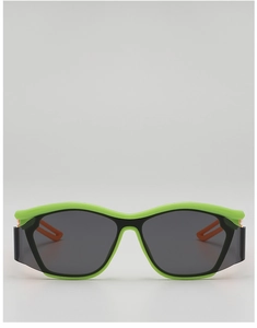 Close-up of vibrant green and black sports sunglasses for kids with grey UV lenses