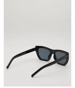 Detailed close-up of thick acetate temples and hinges on stylish black rectangular sunglasses