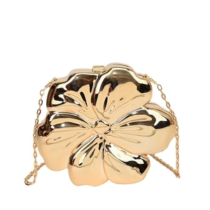 Elegant gold metallic flower-shaped clutch bag with luxury chain strap for evening events