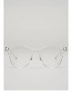 Detailed close-up of clear acetate optical frames with silver arrow metal rivets