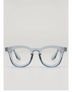 Macro detail of transparent blue retro round frame glasses with small metal rivets