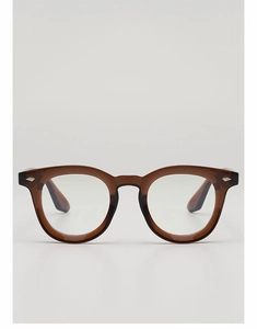 Detailed view of caramel brown translucent glasses frame with silver diamond rivets