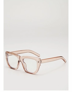 Close-up of vintage champagne thick-frame glasses with metallic stud details