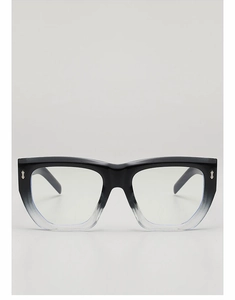 Close-up of black to clear gradient square eyewear frames with silver rivet accents