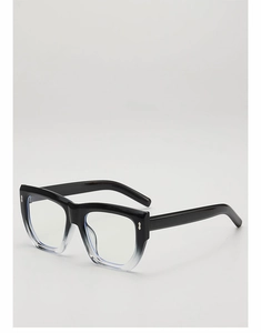 Detail view of stylish square glasses with black to clear gradient and silver wing rivets