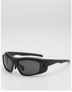Close-up of matte black wrap-around cycling sunglasses with anti-slip textured temples