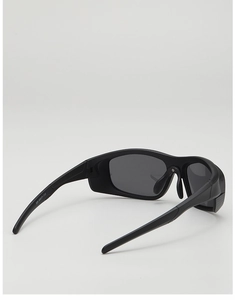 Macro detail of futuristic kids sports sunglasses with model number printing on temple