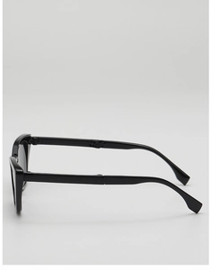 Detail view of foldable kids sunglasses showing sleek black frames and ergonomic temples