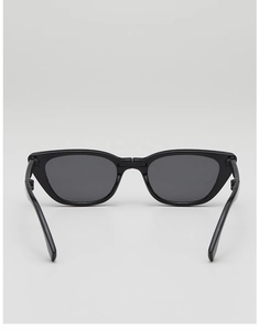 Foldable kids sunglasses detail showing metallic hinges and sleek black frame structure