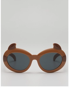 Front view of brown cartoon devil horn sunglasses with dark grey round lenses for kids