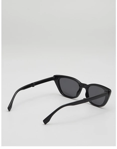 Detail shot of black foldable kids sunglasses with visible metal hinges for storage