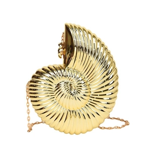 Golden seashell evening clutch bag with metallic textured surface and slim chain strap