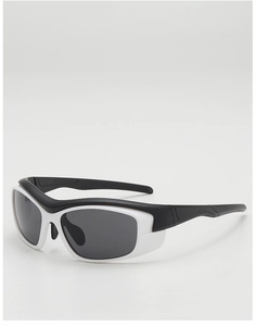 Macro side view of futuristic black and white cycling sunglasses with side protection shields
