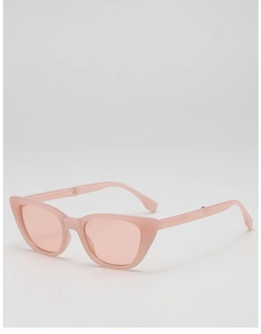 Foldable cat-eye kids sunglasses in translucent light pink resin with UV protection