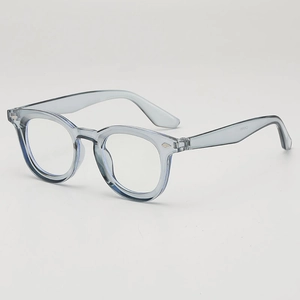 Retro round transparent grey-blue light glasses frame with elegant metal rivet accents