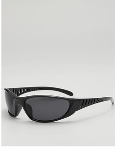 Close-up of black Y2K wraparound sunglasses featuring hollowed-out sweat-venting temples