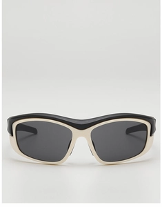 Front view of two-tone futuristic sports sunglasses with black and cream frames for kids