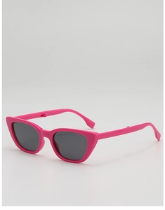 Close-up of rose pink cat-eye foldable sunglasses with dark lenses for kids