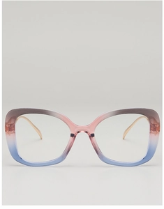 Macro detail of large gradient frame glasses with golden slim metal temples