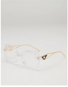 Close-up of golden metal temples with black inverted triangle heart detail on glasses
