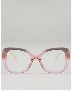 Detail of gradient frame eyewear with metallic temples and stylish hardware accents