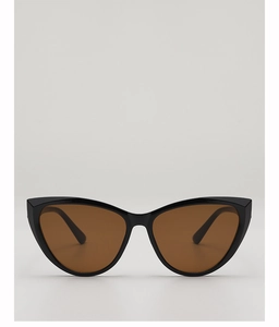 Detailed close-up of retro cat eye sunglasses with black frames and brown resin lenses