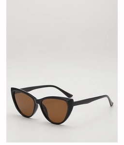 Detailed side view of vintage black cat-eye sunglasses with gradient brown lenses