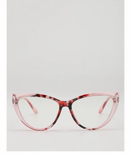 Macro detail of pink cat-eye sunglasses featuring red and black tortoiseshell texture