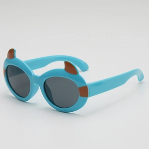 Cartoon little devil sunglasses for kids with sky blue frames and brown ear details