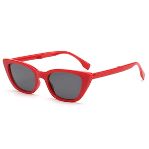 Foldable cat-eye kids sunglasses in bright red with dark lenses for UV protection