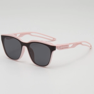 Rosa und schwarze Kinder-Sportsonnenbrille mit hohlem Rahmen und grauen Gläsern für draußen