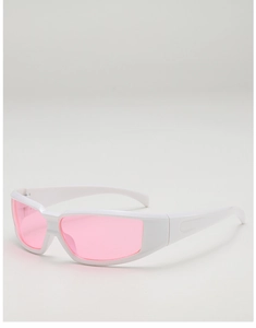 Close-up of white Y2K sports sunglasses with wrap-around frame and pink shield lenses