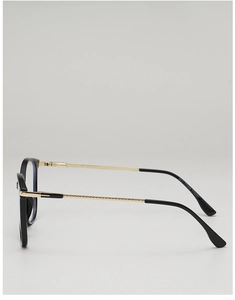 Detail of black frame glasses with slim gold metal temples and model number TR5011
